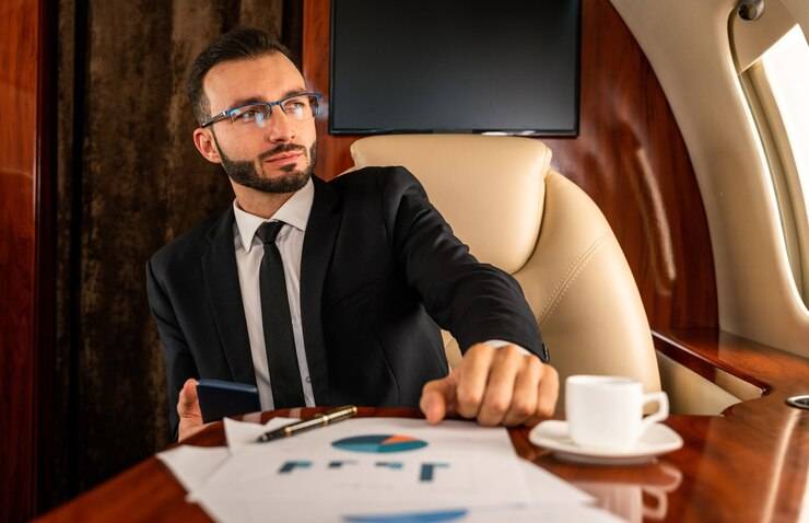 business-man-flying-private-jet_186382-13496